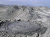 Gobustan, Azerbaijan - Qobustan Rayonu: mud volcano - small eruption and mud volcano skyline - photo by G.Monssen