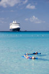 26 Bahamas - Half Moon Cay - Cruise ship passengers on water matresses at Half Moon cay, Bahamas with Holland America cruise ship ms Veendam in background (photo by David Smith)