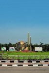 Dakha / Dacca, Bangladesh: roundabout at Hazrat Shahjalal International Airport, formerly Zia International Airport - world and missiles / minarets - photo by M.Torres