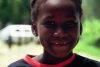 Barbados - Bridgetown: portrait of a school girl (photo by Michael Gunselman)