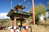 Bhutan - Paro: large prayer wheel in a school - photo by A.Ferrari