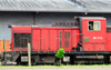 Cameroon, Douala: Alsthom locomotive on the railway line serving Douala harbour, with port warehouses in the background - Boulevard du Gnral Leclerc 27 Aot 1940 - Douala harbor handles most of the country's imports and export  - photo by M.Torres