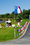 Canada 354 Scenic view Acadian flags during the 400th anniversary of the landing of the French in North America in Acadian region near Pubnico in western Nova Scotia, Canada - photo by D.Smith