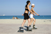 La Pineda, Vila-seca, Costa Dorada, Tarragona, Catalonia: two women roller skating along the beach - photo by B.Henry