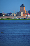 Kinshasa, Democratic Republic of the Congo: Congo river, the port and the Sozacom / Gecamines tower - Gombe district - photo by M.Torres