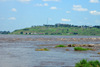 Kinshasa, Democratic Republic of the Congo: Livingstone Falls / Chutes du Djou -  rapids on the lower course of the Congo River, border between the Congos - Ngaliema hill (ex-Mt Stanley) with the 'African Union city' in the background, including the Presidential Palace and the Ministry of Defense - photo by M.Torres