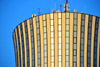 Brazzaville, Congo: top floors of the Nabemba tower / Tour Nabemba, aka Elf Tower, built by Elf Aquitaine Congo, houses the offices of Total - skyscraper by architect Jean Marie Legrand - seen against blue sky - Poto-Poto - photo by M.Torres