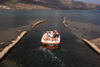 Crete, Greece - Elounda, Lassithi prefecture: back from joy ride - boat rear with women in bikini - photo by A.Dnieprowsky