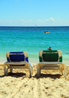 Punta Cana, Dominican Republic: two lounge chairs and the Ocean - Arena Gorda Beach - photo by M.Torres