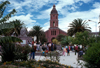 Ecuador - Otavalo, Imbabura province: Church and square with people - photo by J.Fekete