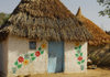 Eritrea - Hagaz, Anseba region - house decorated with floral motives - thatched roof - photo by E.Petitalot