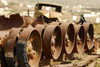 Eritrea - Mendefera, Southern region: tank wreck in a battle field - rollers without the caterpillar track - photo by E.Petitalot