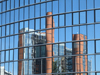 Le Havre, Seine-Maritime, Haute-Normandie, France: International Trade Centre reflected in the glass facade of the CMA GGM building - photo by A.Bartel