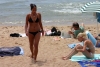 Cannes: blonde and brunette - bikinis on the beach (photo by C.Blam)