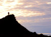 19 Franz Josef Land: Armed guard on lookout hill, Hall Island - photo by B.Cain