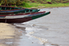 Banjul, The Gambia: bows of traditional wooden fishing boats - beach used by fishermen on the south bank of the River Gambia, Banjul island - photo by M.Torres