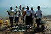 Rubane Island, Bijags Archipelago - UNESCO biosphere reserve, Bubaque sector, Bolama region, Guinea Bissau / Guin Bissau: Hotel Punta Anchaca, fishermen on the beach showing the fish caught - wheelbarrow and crevalle jacks, Caranx hippos / Hotel Punta Anchaca, pescadores a mostrar o peixe apanhado, praia, barco - Xaru-macoa - photo by R.V.Lopes