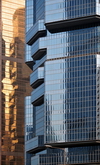 Hong Kong: Lippo Center - twin office towers, previously known as the Bond Center, architect Paul Rudolph, Far East Financial Centre in the background - Admiralty - photo by M.Torres