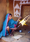 Nuapatna: woman winding silk  (photo by G.Frysinger)