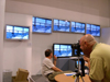 Israel - Tel Aviv: photographer at work at an exhibition - photo by Efi Keren