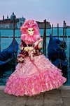 Carnival participant with Carnival costume at Dawn by Canale di San Marco, Venice - photo by A.Beaton