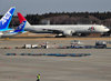 Narita, Chiba Prefecture, Japan: Narita International Airport (Tokyo Narita - NRT) - Japan Airlines (JAL) Boeing 777-346 (ER) cn 32436 taxiing before take off - tails of ANA aircraft on the left - photo by M.Torres