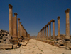 Jerash - Jordan: the Cardo 'Colonnaded Street', still paved with the original stones - Roman city of Gerasa - photo by M.Torres