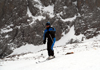 Kazakhstan - Chimbulak ski-resort, Almaty: skier near the top, Talgar crossing at 3200 m - the slalom run is 1500 meters long - photo by M.Torres