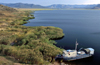 Eastern Kazakhstan - Lake Markakol: fishing boat - mountain lake -  Markakol Sanctuary - South Altai - photo by Vladimir Sidoropolev