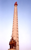 North Korea / DPRK - Pyongyang: Tower of the Juche Idea - Self-Reliance - 70 granite tiers which symbolize the 70th birthday of Kim Il Sung - the torch symbolizes the victory of Juche - photo by M.Torres