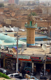 Erbil / Hewler / Arbil / Irbil; Kurdistan; Iraq: shops and Mosque at the base of the citadel - corner of Shar Park and Qalat street - photo by M.Torres