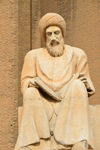 Erbil / Hewler / Arbil / Irbil, Kurdistan, Iraq: front view of the statue of the historian Ibn Al-Mustawfi aka Mubarak Ben Ahmed Sharaf-Aldin at the entrance to Arbil Citadel - minister of Erbil in the era of Sultan Muzafardin - Qelay Hewlr - UNESCO world heritage site - photo by M.Torres