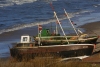 Latvia - Staldzene: fishing boats rest on the beach (Ventspils municipality - Kurzeme) - photo by A.Dnieprowsky