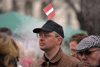 Latvia / Latvija - Riga: Latvian Independence day - wearing the Latvian flag - nationalist (photo by Alex Dnieprowsky)