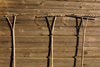 Lithuania - Kurpalaukis: wooden wall with agricultural tools - farm scene - Panevezys county - photo by A.Dnieprowsky