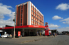 Antananarivo / Tananarive / Tana - Analamanga region, Madagascar: Total petrol station and Bonjour shop - photo by M.Torres