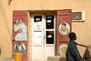 Mali - Mopti - adds at an hairdresser - photo by E.Andersen