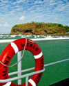 Mamoudzou, Grande-Terre / Mahore, Mayotte: Pointe Mahabou seen from the ferry - life preserver on ship railing - lifebuoy of Salama Djema II - photo by M.Torres