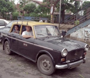 photographer Michel Bergsma driving a taxi in Bombay / Mumbai