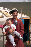 Mongolia - Open Mongolian Steppe - Mongolian-Manchurian grassland: family and Ger (Turkish name 'yurt') - photo by A.Summers