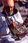 Morocco / Maroc - Marrakesh: musician on the Place Djemaa el Fna - Moroccan musical instrument - rebab - photo by F.Rigaud