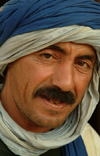 Morocco / Maroc - Man drafting a smile - photo by J.Banks