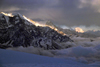 Pokhara, Nepal: sunset on cloudy Annapurna range - photo by E.Petitalot