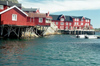 Norway / Norge -  - Lofoten islands (Nordland): houses over the Norwegian Sea (photo by Juraj Kaman)