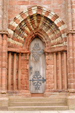 Orkney island, Mainland- Kirkwall - Detail shot of the ornate doorway at Saint Magnus Cathedral, - photo by Carlton McEachern