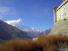 Karimabad / Baltit - Northern Areas, Pakistan: Rakaposhi peak and Baltit fort - Hunza Valley - KKH - photo by D.Steppuhn