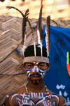 Pakistan - Karachi (Sindh): dancer entertaining audiences at the Sea Festival in Lyari - feather headgear - hat - photo by R.Zafar