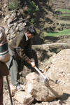 Kodar Bala, Siran Valley, North-West Frontier Province / NWFP, Pakistan: young man breaking stones for construction - photo by R.Zafar