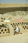 Chan Chan, Trujillo, La Libertad region, Peru: Palacio Tschudi - archeologists at work using parasols in the Chan Chan archaeological site - Moche / Chimu civilization - UNESCO World Heritage site - photo by D.Smith