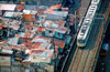 Metro Manila, Philippines - Elevated Light Rail Track LRT and slum - photo by B.Henry